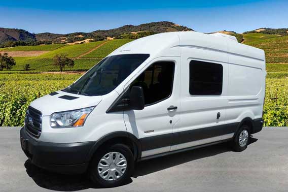 White Ford Transit camper van conversion.