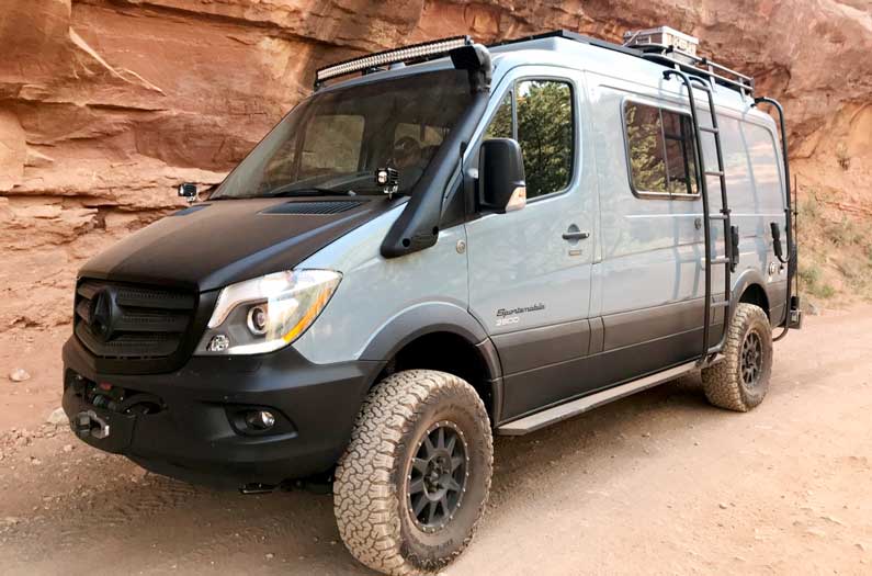 Custom light blue Sportsmobile conversion van.