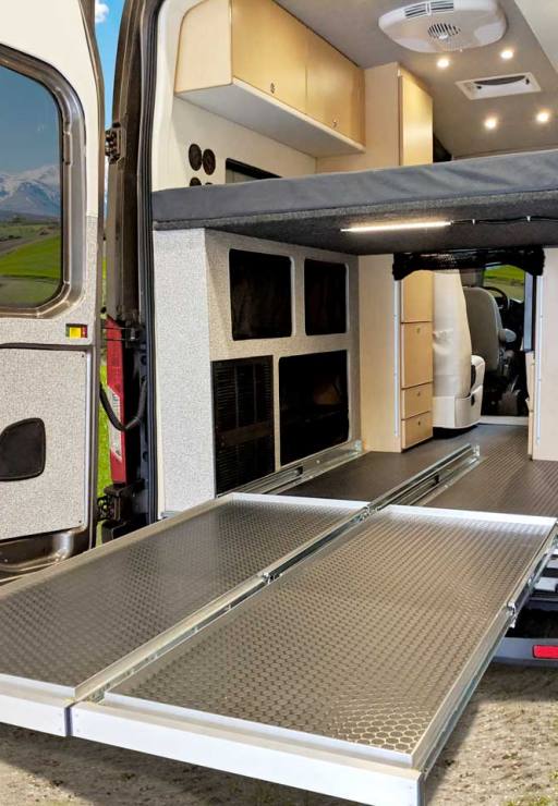 Cabinets and pull out trays allow for storage and access.