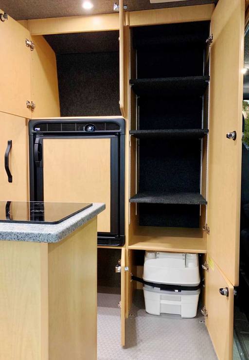 Plenty of storage upfront with tall cabinets.